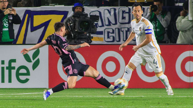 Lionel Messi pictured (left) shooting to score a late equalizer for Inter Miami in a 1-1 draw at Los Angeles Galaxy in the MLS in February 2024